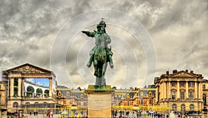 Statue of Louis XIV in front of the Palace of Versailles