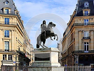 Statue of Louis XIV in Paris, France photo