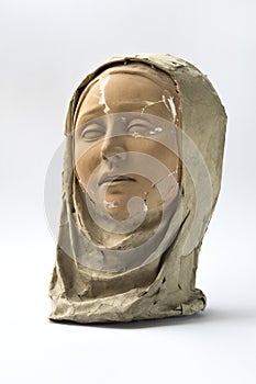 Statue of Madonna head made of papier-mache and terracotta