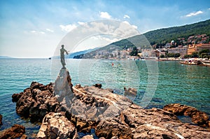 Statue of Maiden with seagull in Opatija, Croatia.