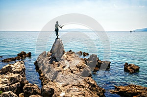 Statue of Maiden with seagull in Opatija, Croatia