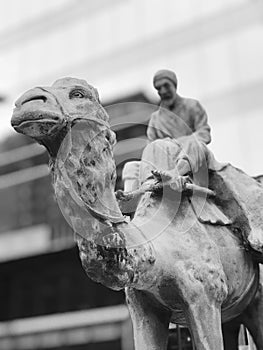 A statue of a man riding a camel - Lexington - Kentucky - Sculpture