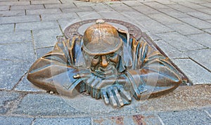 Statue Man at work in Bratislava city, Slovakia