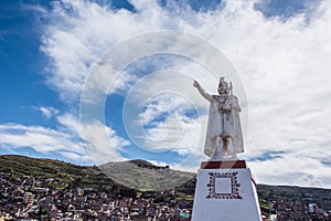 A statue of Manco Capac in Huajsapata Park overlooking the city of Puno in Peru photo