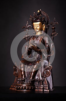 The statue of Maytreya - Buddha of future, made of metal