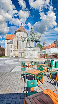 Statue of Michael the Brave and St Michael\'s Roman Catholic Cathedral in medieval fortress of Alba Iulia (Carolina