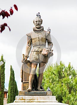 Statue of Miguel de Cervantes, author of Don Quixote photo