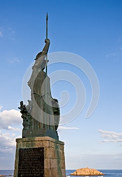 Statue of Minerva on the enbankment of Tossa de Mar, Spain photo