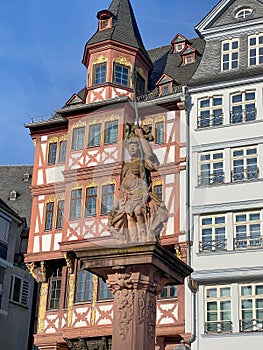 Statue of Minerva situated in front of timbered houses at Romerberg, Frankfurt