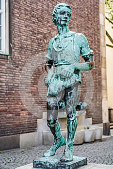 Statue of a molder boy by Willi Hoselmann 1932 2 in the old town market square in Dusseldorf, North Rhine Westphalia, Germany