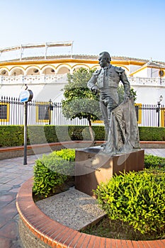 Statue and monument to the Torero Curro Romero in Seville, Andalucia, Spain photo