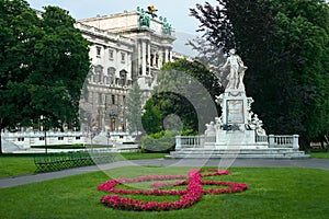 Statue of Mozart and Hofburg palace photo