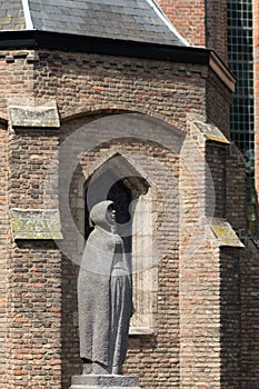 Statue next to Oude Kerk Delft