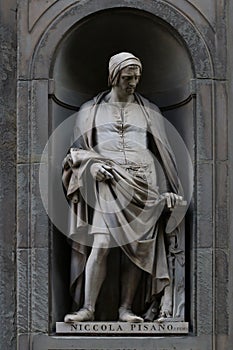 Statue of Nicola Pisano, italian famous sculptor, Florence, Tuscany, Italy photo