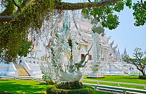 The statue of Nok Hatsadiling in garden of White Temple, Chiang Rai, Thailand