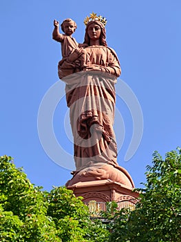 The statue of Notre-Dame-de-France dominating the city of Le Puy-en-Velay