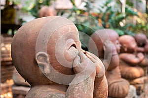 Statue of novices in Wat Lokmolee Lokmolee Temple Chiang Mai Thailand