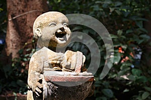 Statue of novices in Wat Umong Chiang Mai. Thailand