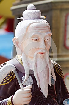 Statue of old Chinese man.