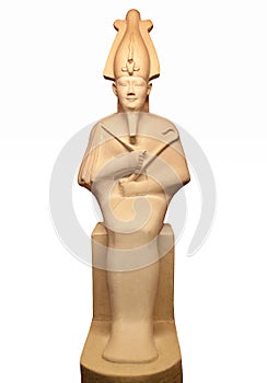 Statue of Osiris isolated on white. He was son of Ra, lord of the dead and rebirth, god of fertility, agriculture in ancient Egypt