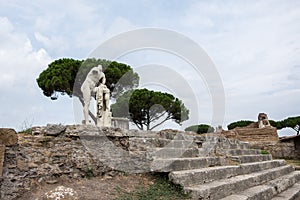 Statue in Ostia among ruins