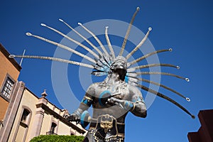 Statue of an otomi warrior in Mexico photo