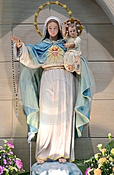 Statue of Our lady virgin Mary with Child Jesus in catholic church, Thailand.