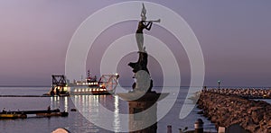 Statue overseeing the night labor project