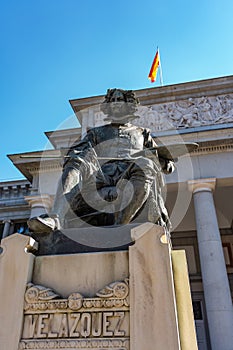 Statue of the painter Velazquez on the main facade of the Prado Museum in Madrid, Spain.