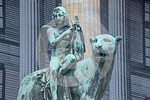 Statue of a panther with genius of music, an angel with wings and a harp, stringed musical instrument at Concert Hall Konzerthaus