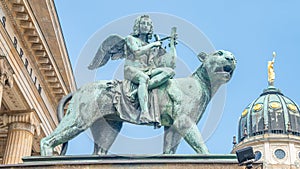 Statue of a panther with genius of music, an angel with wings and a harp, stringed musical instrument at Concert Hall Konzerthaus