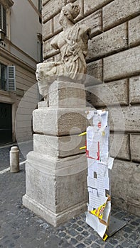 Statue of Paquino with free speech fliers, Rome, Italy