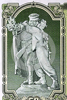 Statue of partisan with Russian soldier from Czechoslovak money