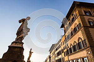 A statue at the Ponte Santa Trinita bridge in Florence, Italy