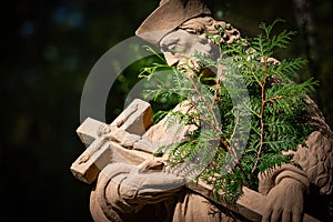 Statue of priest in city park of Bad Mergentheim