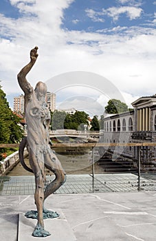 Statue of Prometheus on Butcher's Bridge with padlocks Ljubljani