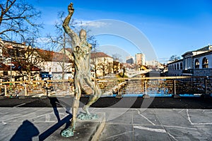Statue of Prometheus on Butchers` bridge over river Ljubljanica, photo