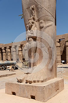 The statue of Ramses II with his daughter Merit-Amon in the temple of Amun-RA in Karnak, Luxor, Egypt