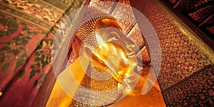 Statue of the Reclining Buddha inside the Wat Pho temple.