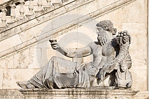 Statue Of A Reclining Figure In Piazza Del Campidoglio in Rome