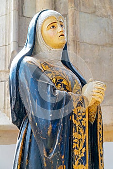 Statue representing D.Isabel da Silva, Counts of Penelva.  Interior nave of the church of SÃ£o JoÃ£o AlporÃ£o, SantarÃ©m-Portugal photo
