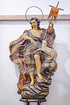 statue representing John the Baptist inside the Igreja Matriz de Colares Nossa Senhora da AssunÃ§Ã£o photo