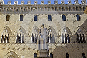 Statue representing Sallustio Bandini in Salimbeni square in Siena