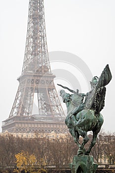 Statue of resurgent France pointing towards the Eiffel Tower from the Bir Hakeim bridge in Paris 1