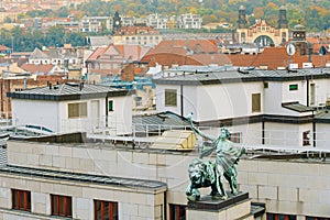 Statue on roof of entrance to the bank Czech National Bank