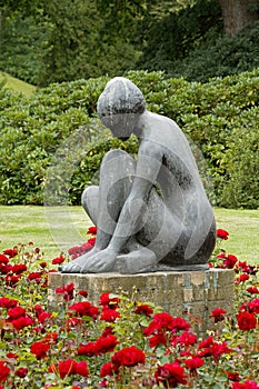 Statue in rose garden