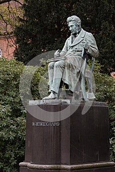 Statue of SÃ¸ren Kierkegaard in the Royal Library Garden in Copenhagen