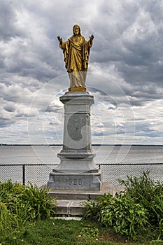 Statue of the Sacred Heart of Jesus on the shores of Lake Saint-Louis
