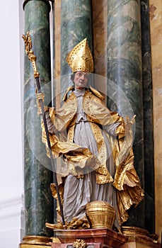 Statue of Saint, Altar in Collegiate church in Salzburg
