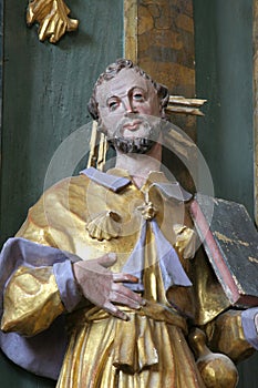 Statue of Saint on the altar of the St Roch in the Church of St Mary Magdalene in Cazma, Croatia photo